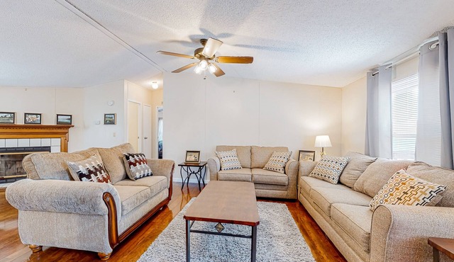 Riverfront home w/free attraction tickets, water views, firepit, deck