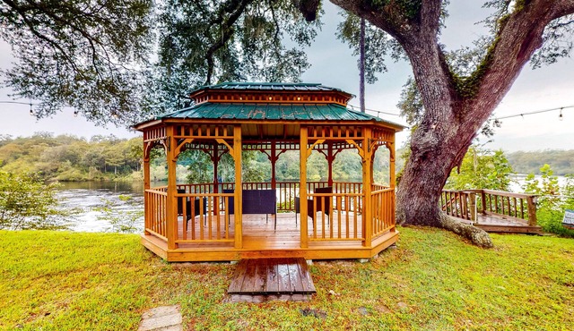 Riverfront home with amazing views, private dock, boat house & boat lift