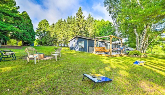 Riverfront Home with Dock about 6 Mi to Cheboygan!