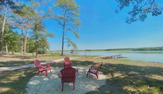 Riverfront home with hot tub, playground, kayaks, and amazing panoramic views!