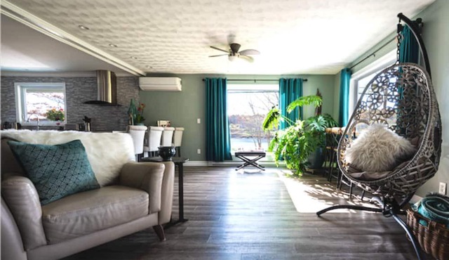 Riverfront Home with Outdoor Living Spaces and Hot Tub