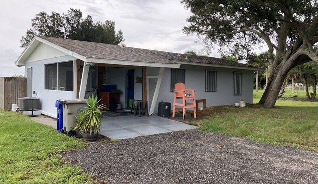 Riverfront home with a boat dock, WiFi, AC