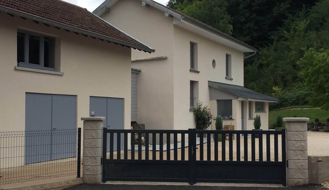 Riverfront house with beautiful private grounds.