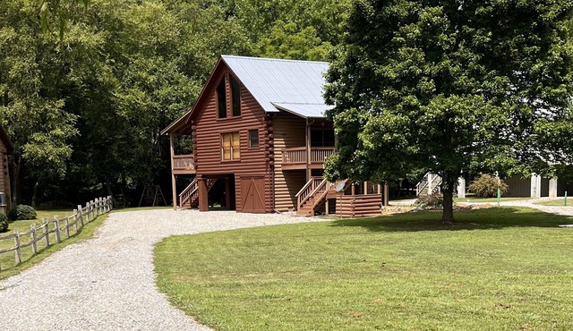 Riverfront Log Cabin with Hot Tub-Tubing on the River, Pet Friendly.