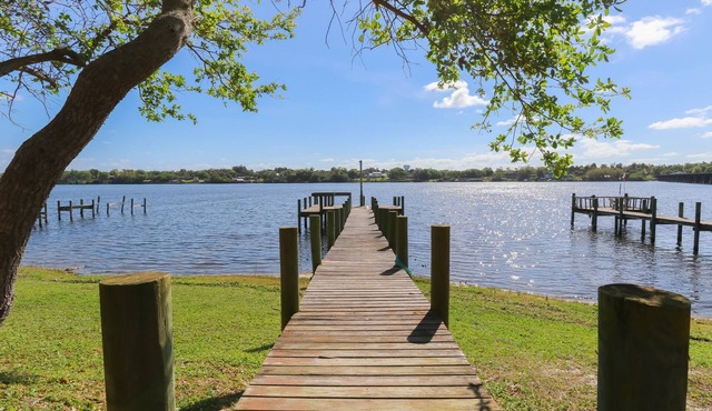 Riverfront Retreat, Private Docks, on Small Acreage.