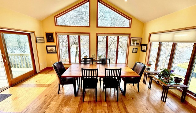 Riverfront retreat with pier near convention center and downtown Janesville