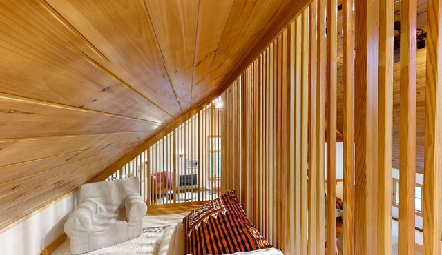 Riverside cabin with mountain views, beach access, children's items, & firepit