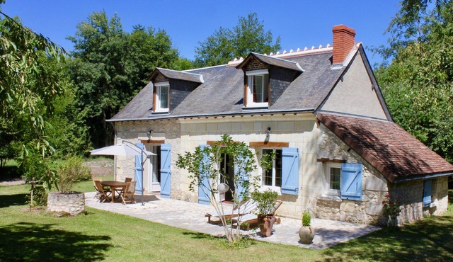 Riverside cottage with large garden.