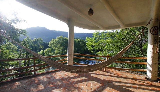 Riverside eco-home with beautiful canyon views.
