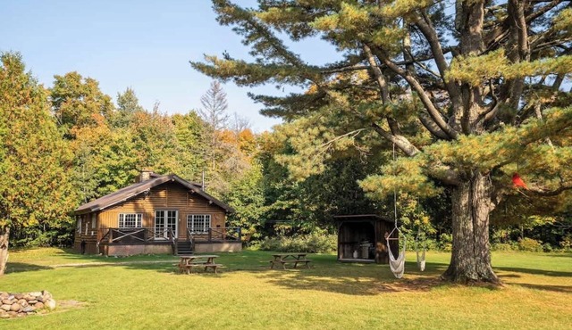 Riverside Log Cabin with Hot Tub and Fireplaces