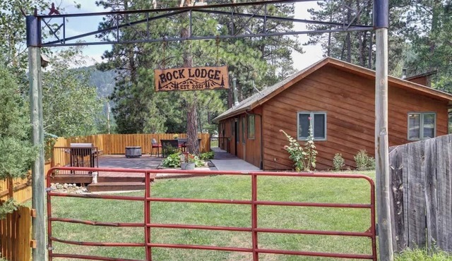 Rock Lodge Complete with Covered Parking and a Hot Tub!