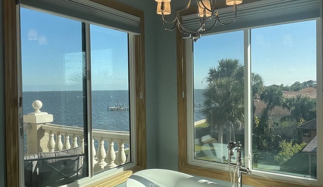 Rocket Launches and River Views! Multiple balconies, huge screened in porch.