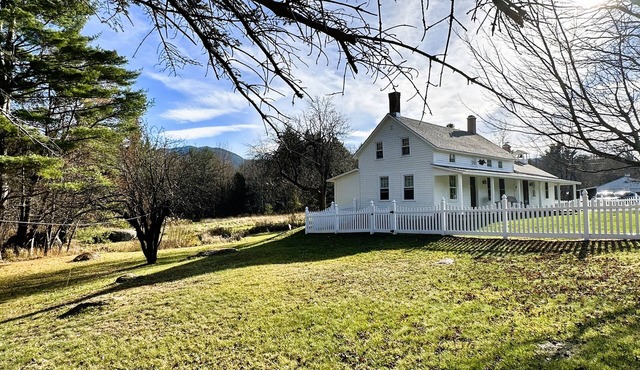 Rocky Branch Retreat on 33 acres with fenced yard, fireplaces & deck
