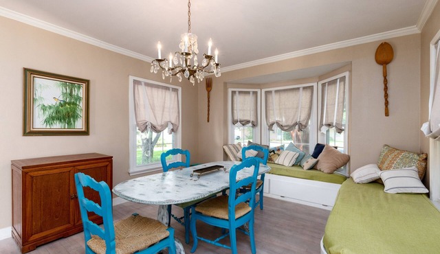 Romantic 1938 Bay House Steps from Ocean Dr Porches, Gardens & Coastal Charm