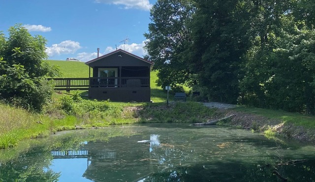 Romantic cabin with fishing and hot tub