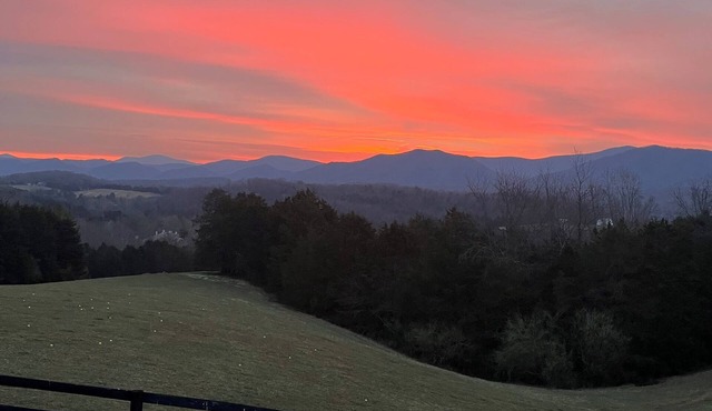 Romantic Couples Getaway | Rustic Post & Beam Cabin with Mountain Views Escape to this immaculate post-and-beam cabin nestled on 42 peaceful acres of rolling pasture and cedar forest — perfect for a romantic retreat!