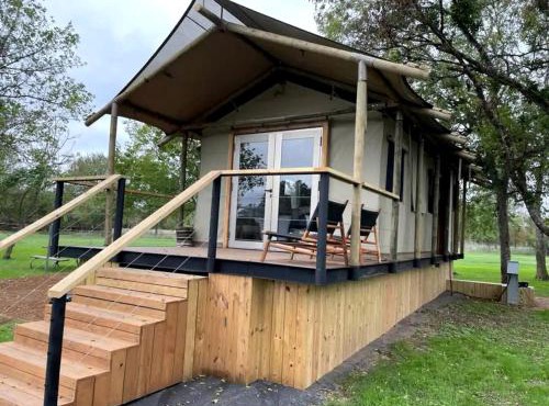 Romantic Lakefront Cabin with Fire Pit near Lake Bastrop, Texas – Luxury Glamping Escape for Couples