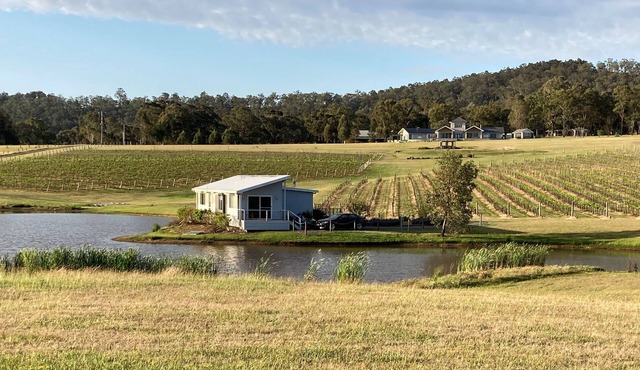 Romantic lakehouse set in a private vineyard in the Hunter Valley