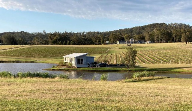 Romantic lakehouse set in a private vineyard in the Hunter Valley