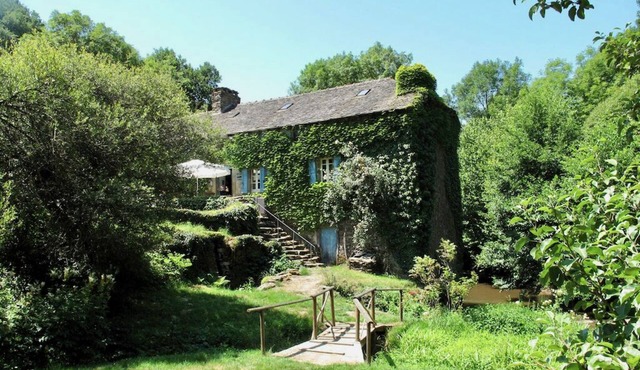 Romantic watermill in idyllic setting