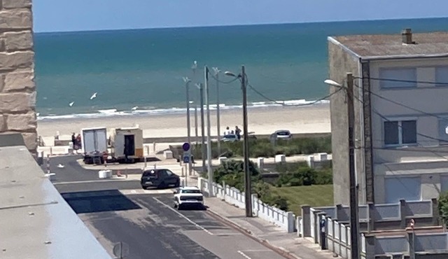 Roof top lighthouse and sea view