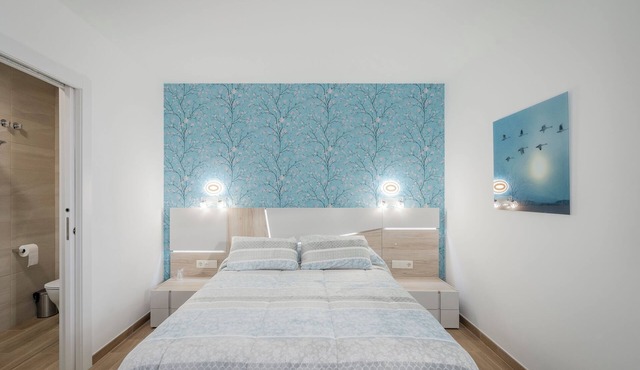 Room '105 Matrimonio Blue' with Shared Garden, Wi-Fi and Air Conditioning