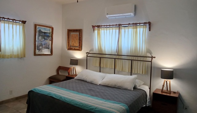 Room #6 Master with one king size bed, one double bed & one double bunk bed