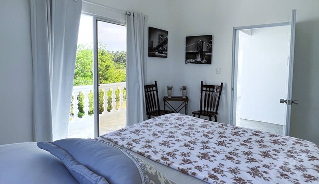 Room w/ocean view balcony next to the beach. 2 pools, fire pit, gardens & more!