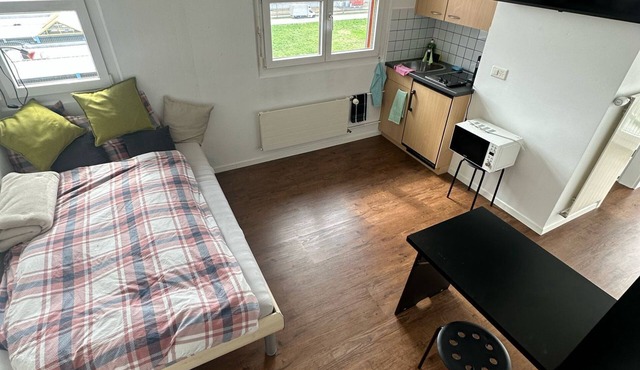 Room with bathroom and balcony