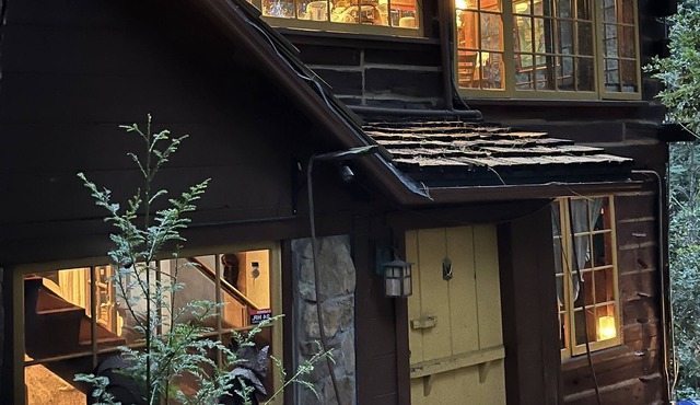 Rooms/tents in quaint original log cabin nestled in the Redwood trees on creek.