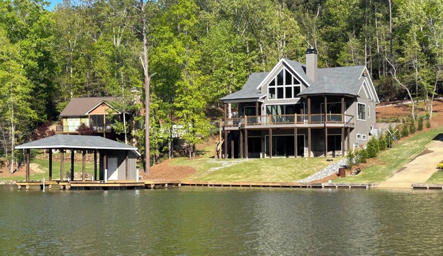 Roomy 5 bedroom lake house tucked in a private deep water cove on Lake Martin.