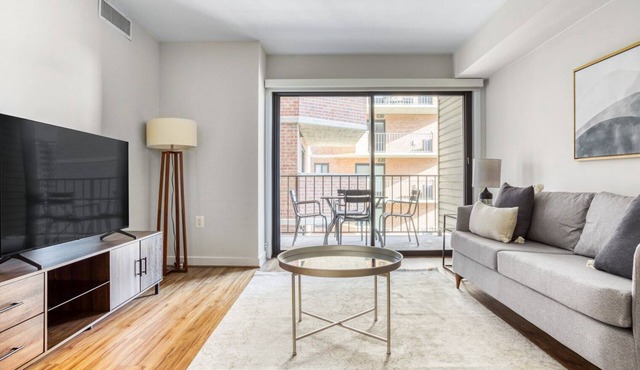 Roomy Clarendon 2BR w/W/D & Gym, across street from WF, by Blueground