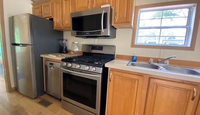 ROOMY PARK MODEL HOME WITH PRIVATE BEDROOM WITH QUEEN SIZE BED, FULL KITCHEN AND BATHROOM, LIVING ROOM WITH PULL-OUT QUEEN-SIZE BED IN COUCH. HAS COVERED PARKING & A DECK, WITH SHED. MONTHLY RATE IS $1,400, BUT PLEASE CALL FOR AVAILABILITY.