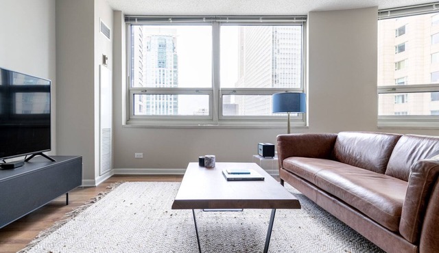 Roomy River North 2BR w/Gym, Deck & Pool, walk to Mag Mile, by Blueground