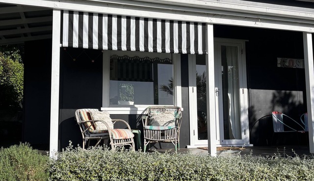 Rosie's cottage in Stanmore Bay , a short walk to beach with a great seaview.