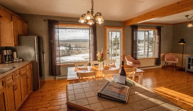Rrustically decorated chalet on two floors with 4 bedrooms.