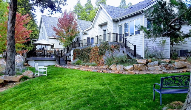 Running Y custom single level home with large deck for relaxing.