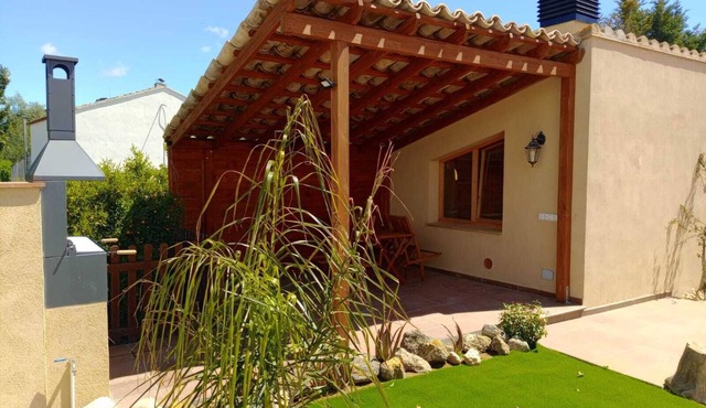 Rural apartment with garden and elevated swimming pool.