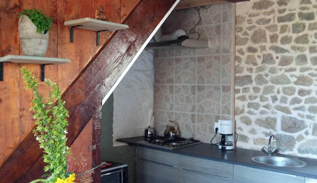 rural cottage with garden overlooking the swimming pond