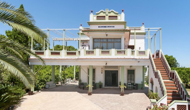 rural farmhouse located in an orange farm itself