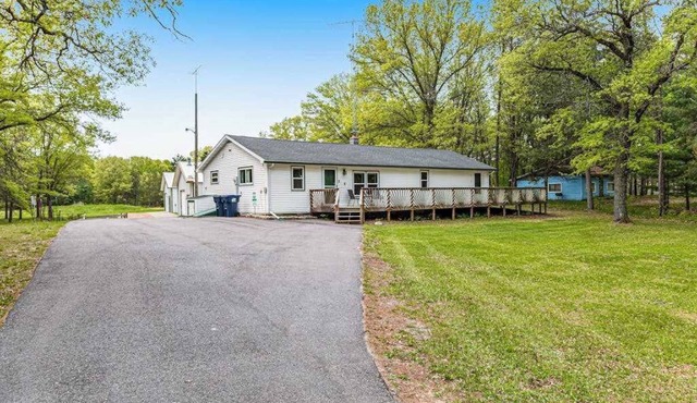 Rural retreat near Necedah National Wildlife Refuge with deck, firepit, & grill