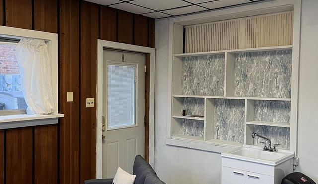 Rustic 1900 building turned cozy studio