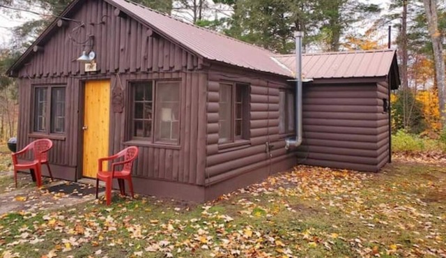 Rustic and cozy knotty pine cabin. The Pine at Hiawatha Cabins