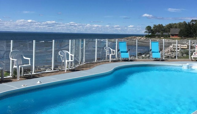 Rustic seaside cottage with private heated pool