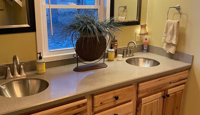 Rustic cabin on 80 acres with access to hiking and ATV trails.