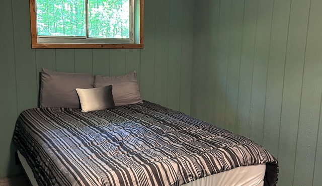 Rustic cabins in secluded campground with lake access and woods to wander in.