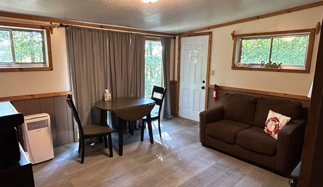 Rustic cabins in secluded campground with lake access and woods to wander in.