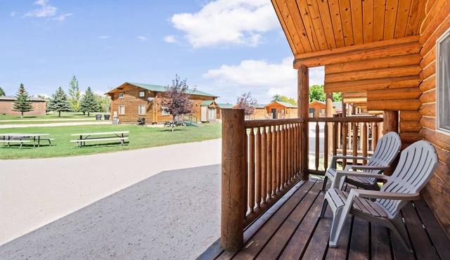 Rustic camping studio with large front porch & kitchenette