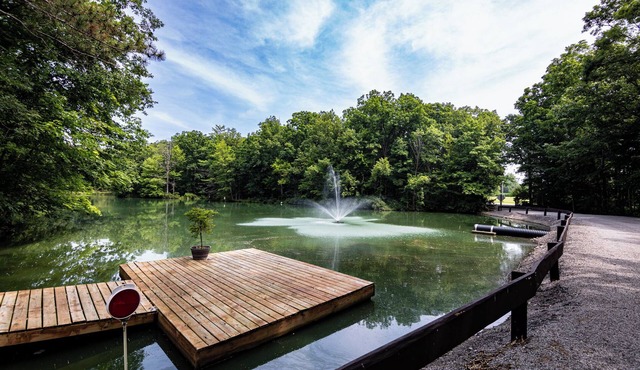 Rustic charm meets modern comfort in this hidden woodland cabin getaway