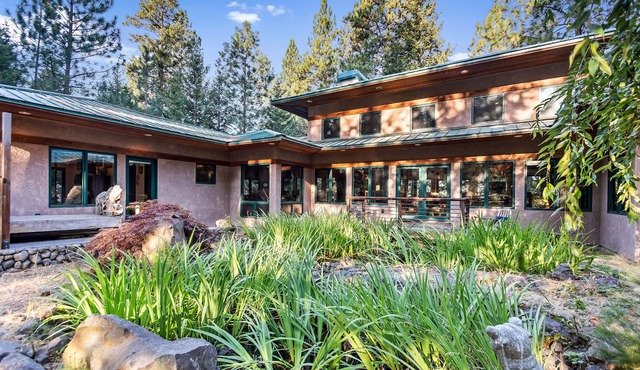 Rustic contemporary home in forest setting overlooking Lake Coeur d'Alene